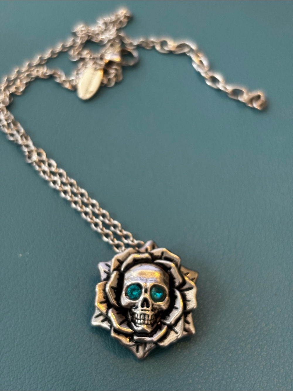Skull Rose Pendant Necklace with Teal Crystal Eyes